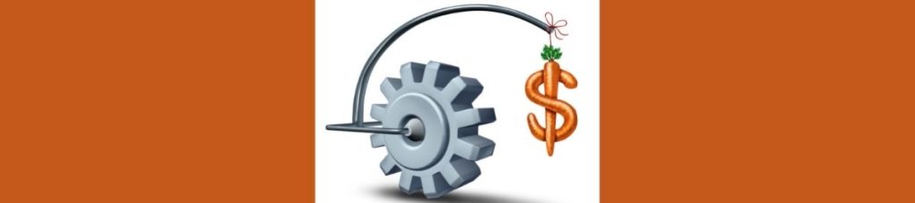Business incentives - image of a wheel, carrott and dollar sign